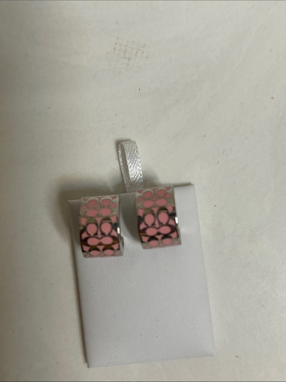 Coach Silver-Tone Hoop Earrings with Pink Signature Pattern - Picture 1 of 2